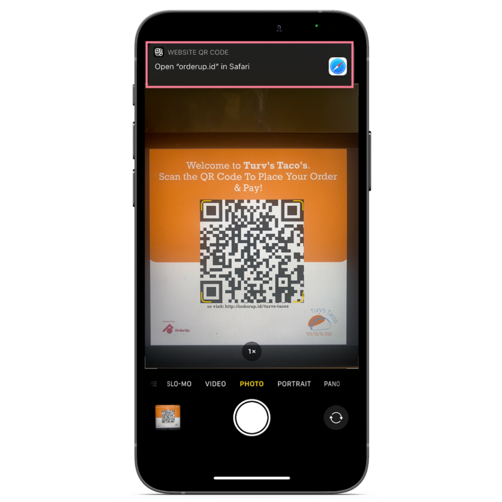 phone scanning qr code to see menu at restaurant