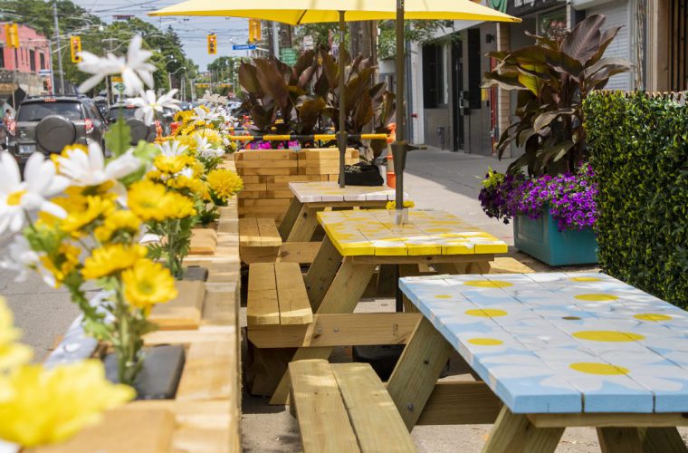 lazy daisy's cafe in toronto storefront with baloons. They use orderup to service their patio with mobile ordering and QR codes